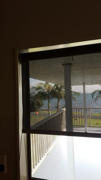 Beach house sunscreen roller shades for sun and UV protection