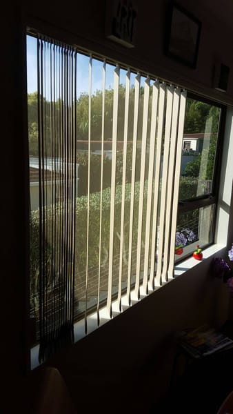 Beach house vertical blinds for light and privacy
