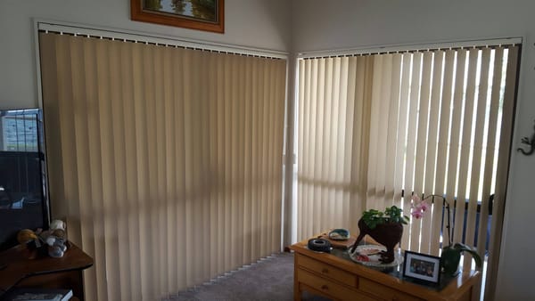 Beach house vertical blinds for light and privacy