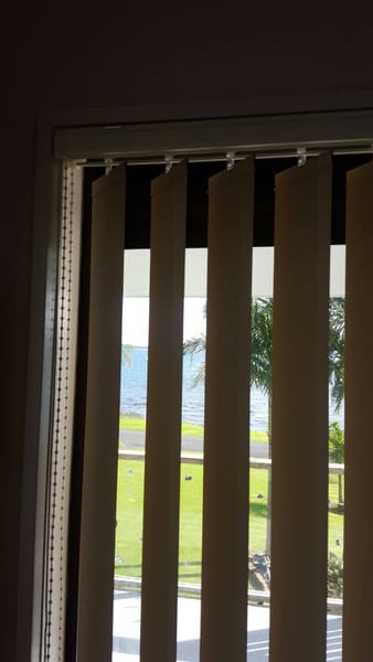 Beach house vertical blinds for light and privacy