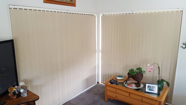 Beach house vertical blinds for light and privacy